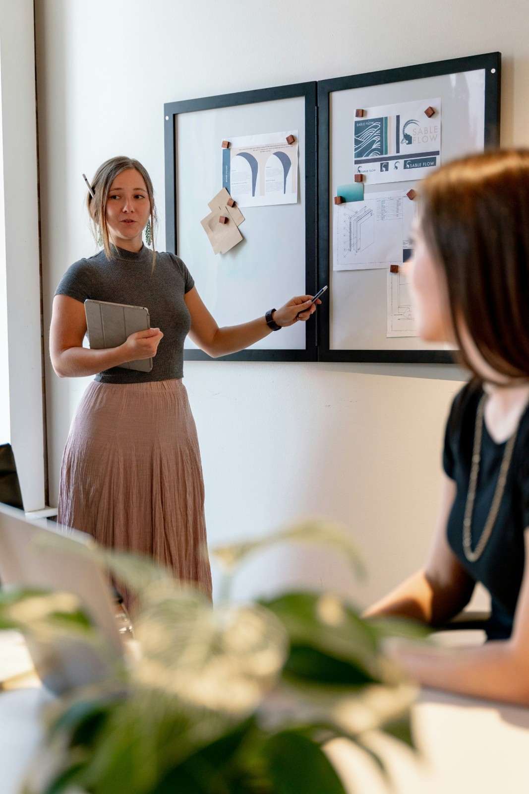 Woman presenting in office setting
